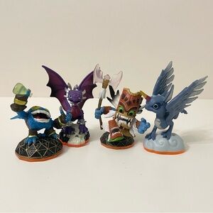 Lot of 4 Skylanders Figures Whirlwind Cynder Double Trouble Totem Pop Fizz